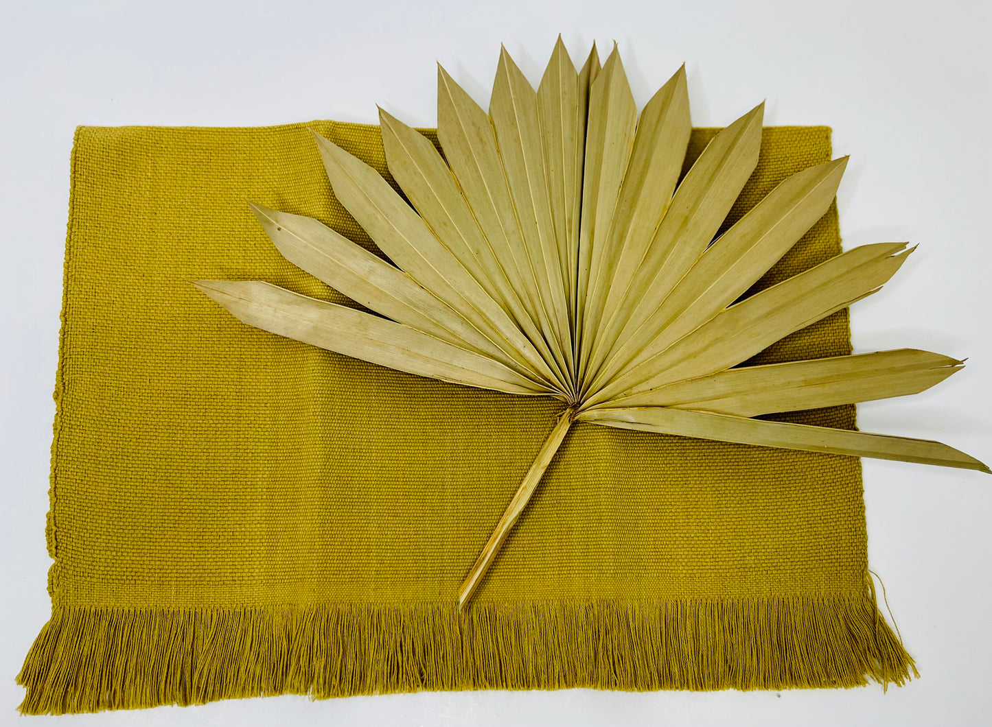 Fringed mustard placemats