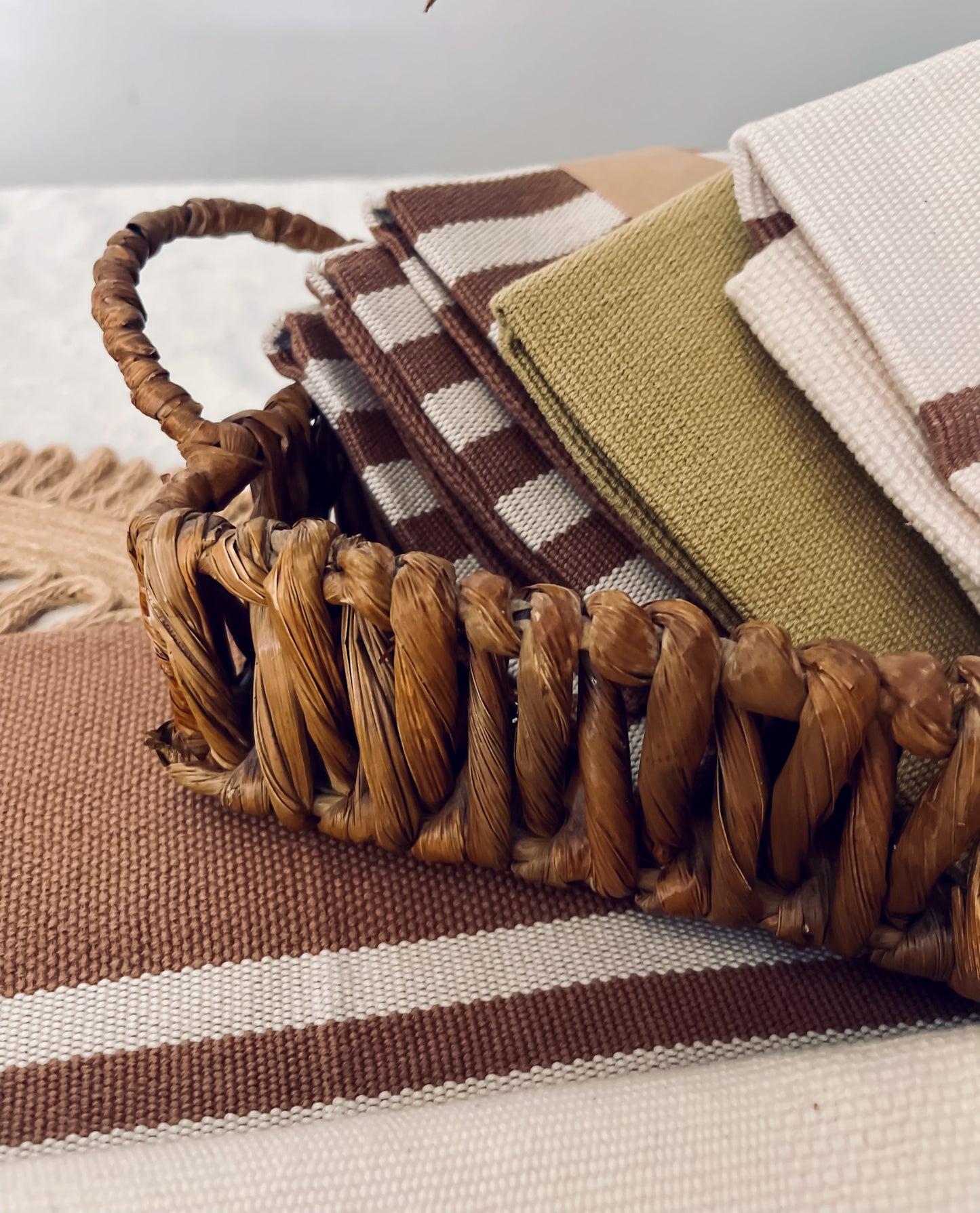 Fringed tan & beige placemat