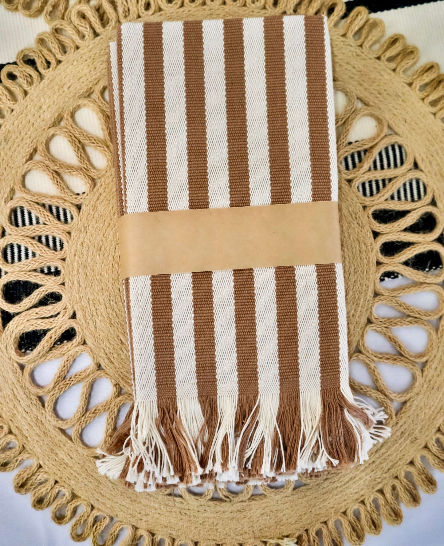 Fringed tan & beige placemat