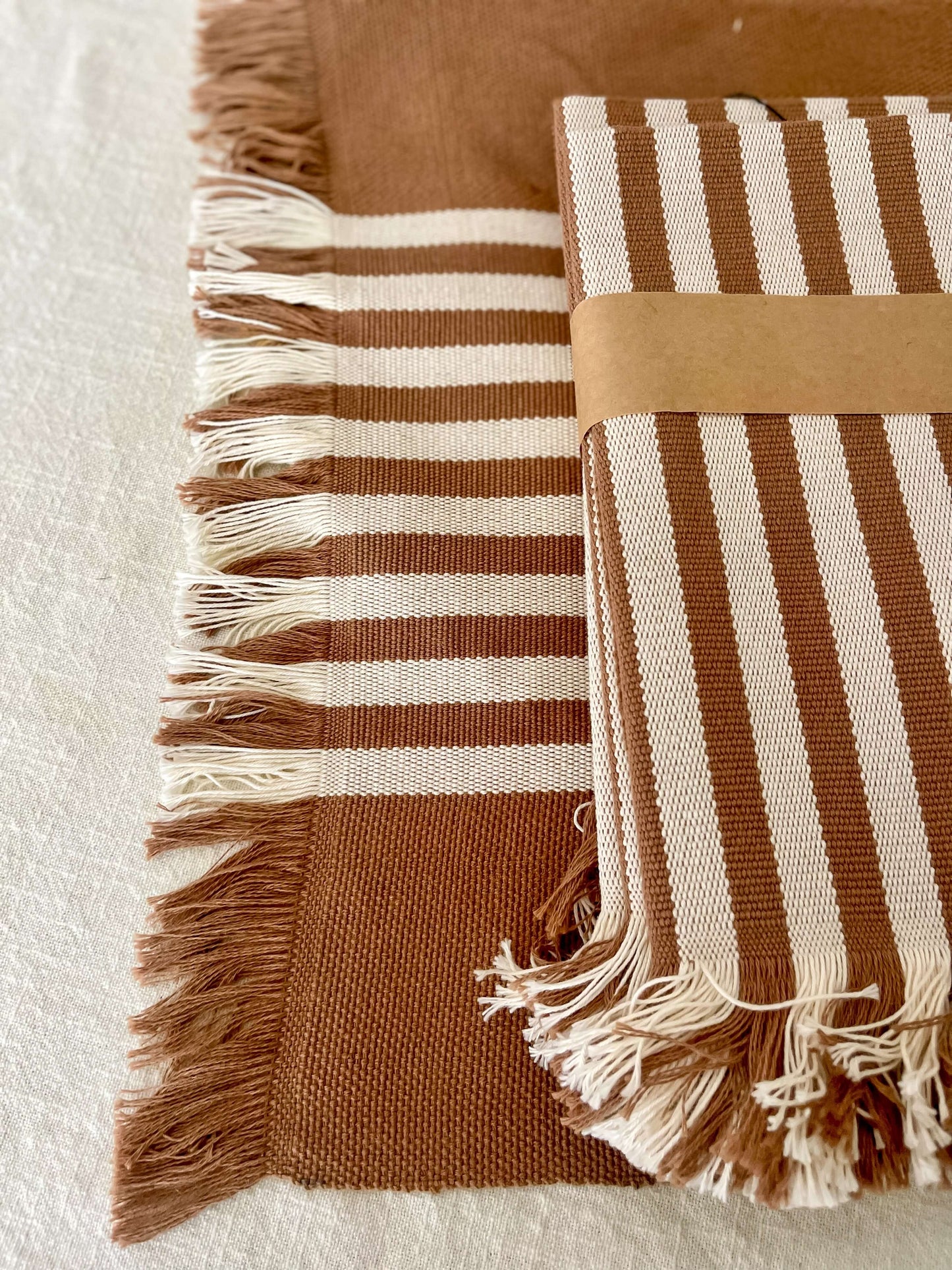 Fringed tan & beige placemat